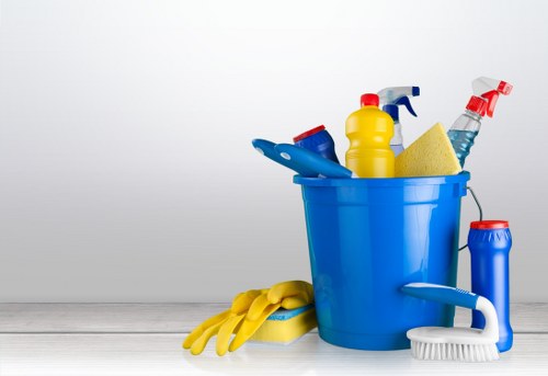 Professional cleaner treating a fabric chair in Mayfair